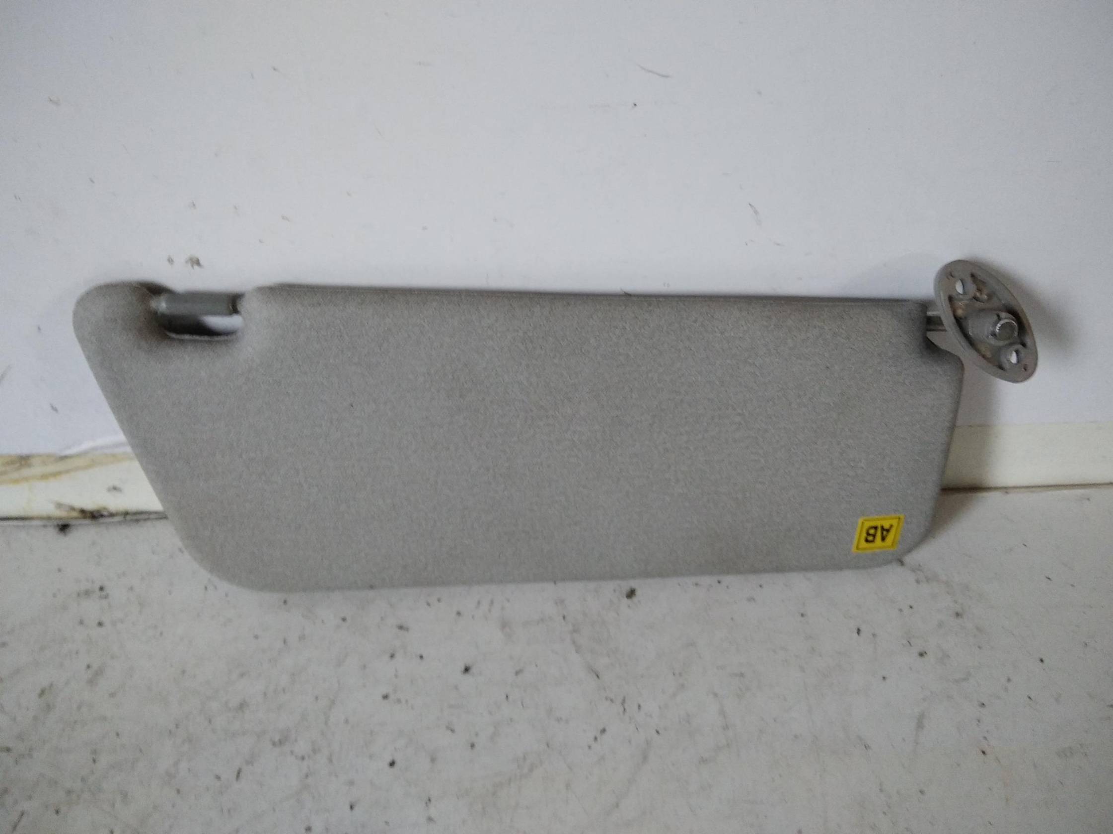 Aletta parasole parabrezza sx.